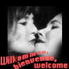 pensnest: Two Kit Kat girls about to kiss, caption Wilkommen, Bienvenue, Welcome (Cabaret)