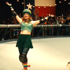 theleaveswant: A white woman (Drew Barrymore as Smashley Simpson) in roller derby uniform makes victory arms in front of Texas flag (ta-da!)