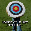 staranise: A person carrying an archery target across a field, text: "Some days, it just feels like..." ([personal] Walking target)