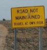 redbird: "Road Not Maintained: Travel at Own Risk" (risk)