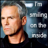 highlander_ii: grumpy-looking Jack O'Neill with text 'I'm smiling on the inside' ([O'Neill] 003)