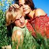 gorgonfondness: (Draco and Mia relaxing in the grass)