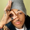 akamine_chan: Travie McCoy wearing a beanie and making an OK sign around his eye (Travie - ok)