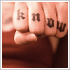 safekeeper: knuckle tattoo of the word "know" in gothic font. (know)