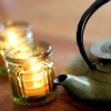 alwayswondered: A teapot with some lighted tea candles beside it. (Tea fixes everything.)