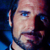director_global: (blue-eyed intensity)