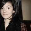 halfwitch: little girl smiling slightly (I'm more content these days)