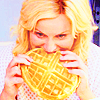 thingswithwings: Leslie Knope nomming a waffle (p&r - leslie nomming a waffle!)