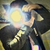 freddiefraggles: Photo of me in the mirror, holding up camera. (me - camera)