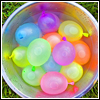 ahouseforrain: water baloons in metal tub (would I do that?)