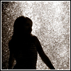 ahouseforrain: woman's silhouette against backlit fountain (in plain sight)