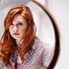 amihan: animated icon of karen gillan as amy pond in 'doctor who' looking at the mirror ([doctor who] amy (signal))