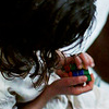halfwitch: little girl using a Rubik cube (Solve the puzzle)