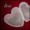 leora: A heart-shaped tea-holder and the word "tea". (tea)