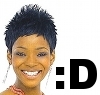eldabe: A picture of Caroline Chikezie smiling, with a smiley symbol (Caroline Chikezie Smiling)