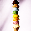 skieswideopen: An ice cream cone stacked with eight scoops of ice cream in various colours (ice cream)