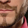 omnomnomnomnom: a close up of a beard which twists and swirls like the sea (brb consulting my beard)