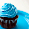 frangipani: a chocolate cupcake with swirly icing on top (blue-tinted blush)