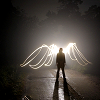 angelbabe_cj: Image of man with 'angel wings' formed of neon lights in black and white (angel light wings)