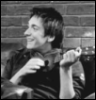 sporky_rat: One of the Phelps brothers with a ukulele in greyscale. (ukuleles are badass)