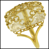 skywardprodigal: gold ring with clear white-ish stone with gold mesh over the stone (bling-warisnetted)