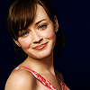 bookblather: Alexis Bledel in red sundress smiling at the camera. (in the heart : clara : alexis bledel)