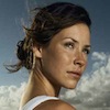 bookblather: Evangeline Lilly with her hair in a bun, looking camera right distantly. (in the heart : melanie : evangeline lill)