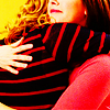 automaticdoor: britta and annie from community hugging, annie's face is visible (brannie hug 1 (annie))