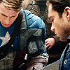 medie: Steve Rogers and Bucky Barnes bent over a map in the 2011 Captain America film (mcu - cap and bucky - planning)