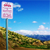 tablesaw: A trial sign ("This trail is OPEN") against a blue sky in Los Angeles's Griffith Park. (Hiking (Open Trails))