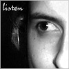 northern: part of my face, with headphone. black and white. (listening)
