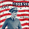 catechism: vintage magazine cover of a military dude in a sweater with red & white stripes behind him; text says 'knit for defense' (knit for defense)