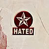 catechism: dark red soviet-looking star with the word 'hated' underneath (hated)