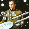 eillam: Jim Kirk holding an Enterprise model, text "what is this? a starship for ants?" (starship for ants)