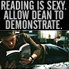 fish_echo: text 'reading is sexy' above a picture of Dean (SPN) reading a book whilst lying on a bed (Fandom-SPN-Dean 'reading is sexy')