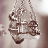 samecgh: A crystal pendant with a pentacle wrapped around (Crystal)