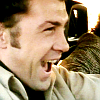sineala: Bodie (from Pros) driving a car and smiling happily (Professionals: Bodie Smiles)