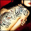 sporky_rat: A dark haired woman with a dark blue eastern dragon tattoo (all the poison coming to the top)