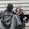 shinyhappygoth: photo of me reading Understanding Comics on Shakespeare's lap, http://www.flickr.com/photos/rabbitdance/3066976113/ (Shakespeare)