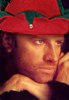 rhi: Connor MacLeod, wearing a red and green elf's hat. (Midwinter Connor)