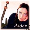 rhi: A sword in the background, Aidan leaning chin on hand.   (Aidan)