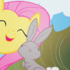 alittlekindness: Fluttershy with her eyes closed, nuzzling a rabbit (must love rabbits)