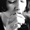 amihan: close-up black and white image of audrey tautou as amelie poulain in 'amelie' taking a shot ([amelie] drink)