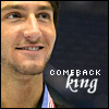 lannamichaels: Evan Lysacek on a medals podium wearing a medal. Text: Comback king. (evan - comeback king - medal, evan comeback 2, figure skating 6)