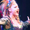 scaramouche: Kerry Ellis as Meat from We Will Rock You, singing (meat belts out a tune)