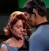 ext_387759: Screengrab from "Turnabout Intruder", Spock prepared to meld with Janice who is really Kirk (Castiel mistletoe xmas SPN)