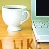 es: Laptop and a teacup (al lavoro)