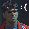 scheherezhad: Kavan Smith in "Stark Raving Mad", frowning and wearing a red jacket and a pair of goggles. (kavan frowny)