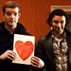 thingswithwings: george and mitchell hold up a BIG RED HEART (bh - george and mitchell HEART)