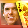 rhi: Cory Raines, grinning next to a jack of spades (Cory)